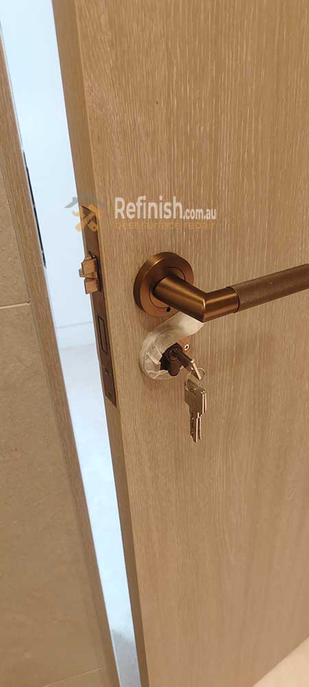 On-site colour matching in Ryde: Blending custom tints to match the natural timber depth.