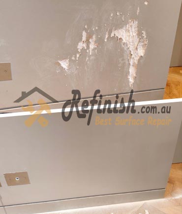 Seamless Deep Grey Wall Repair: Invisible Pet Damage Restoration